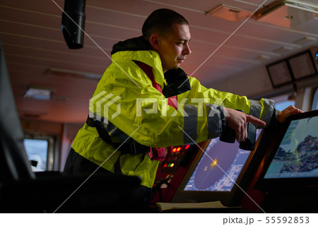 Navigator. pilot, captain as part of ship crew 55592853