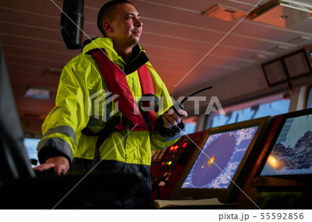 Navigator. pilot, captain as part of ship crew 55592856