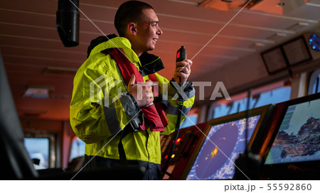 Navigator. pilot, captain as part of ship crew Navigator. pilot, captain as part of ship crew 55592860
