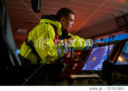 Navigator. pilot, captain as part of ship crew Navigator. pilot, captain as part of ship crew 55592861
