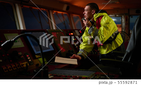 Navigator. pilot, captain as part of ship crew Navigator. pilot, captain as part of ship crew 55592871