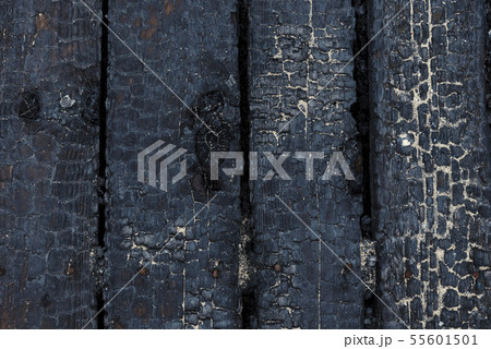 Black burnt wooden background Textured board Black burnt wooden background Textured board 55601501