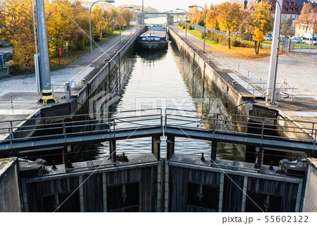 Boat is passing through canal Boat is passing through canal 55602122