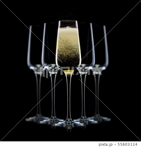 Set of luxury champagne glasses in a row isolated on a black background 55603114