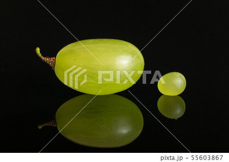 Fresh green grape isolated on black glass Fresh green grape isolated on black glass 55603867