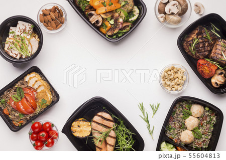 Frame of healthy food in black boxes with blank space on white Frame of healthy food in black boxes with blank space on white 55604813