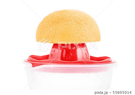 Close-up of a squeezer and an orange 55605014
