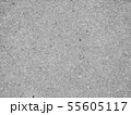Grey grainy textured asphalt closeup photo 55605117