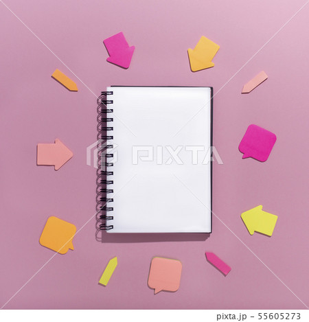 Stickers arrows showing promotion on notepad with blank space 55605273