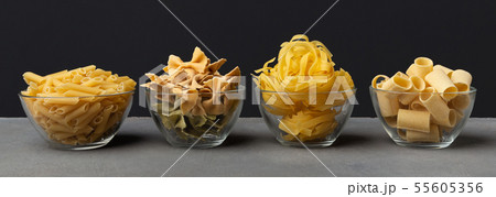 Different shape pasta with carbohydrates on black background 55605356