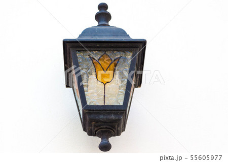Vintage lantern on the wall in white 55605977