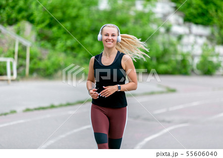 Fitness lifestyle. Thirty-year-old young woman Fitness lifestyle. Thirty-year-old young woman 55606040