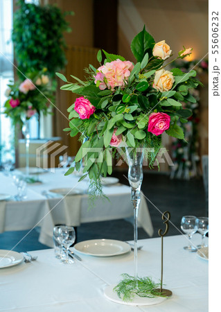 Beautiful table setting with crockery and flower Beautiful table setting with crockery and flower 55606232