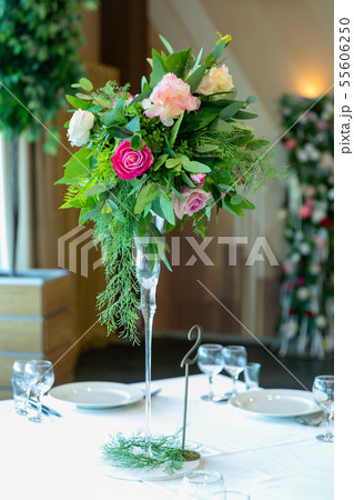 Beautiful table setting with crockery and flower Beautiful table setting with crockery and flower 55606250