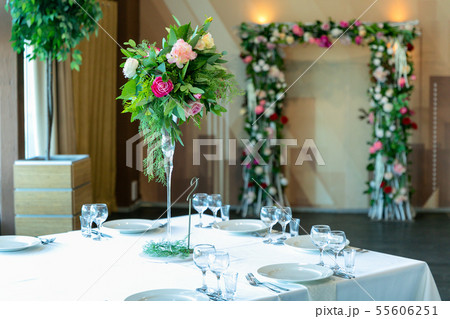 Beautiful table setting with crockery and flower Beautiful table setting with crockery and flower 55606251
