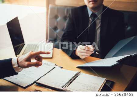Men employee are describing the employment history Men employee are describing the employment history 55638458