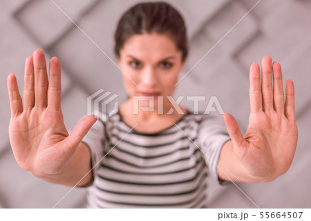 Young woman saying stop with her gesture 55664507