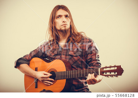 Guitarist is playing the guitar. Guitarist is playing the guitar. 55668128
