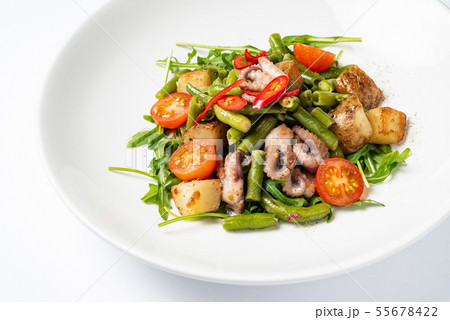 salad with baby octopus and vegetables 55678422