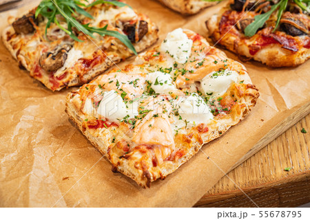 slice of italian pizza in the pizzeria 55678795