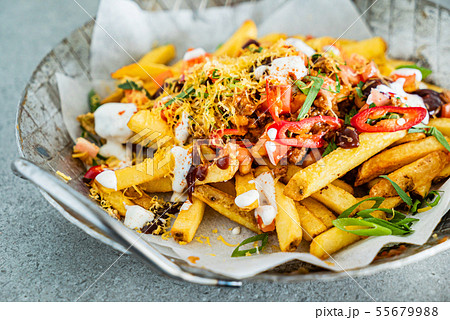 french fries with minced meat, beans and vegetables french fries with minced meat, beans and vegetables 55679988