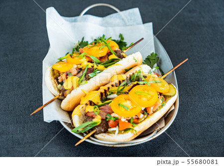 hot dogs with kebabs and vegetables hot dogs with kebabs and vegetables 55680081