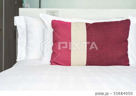 Beautiful comfortable pillow and blanket on bed decoration 55684050