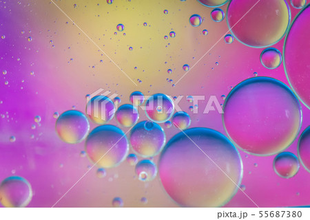Defocused multicolored abstract background picture made with oil, water and soap Defocused multicolored abstract background picture made with oil, water and soap 55687380