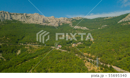 Crimea trip: view from drone of curvy mountain road 55695340