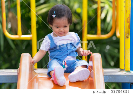 Happy small child on the playground in the park 55704335
