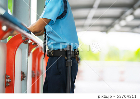 Security guard officers are checking the area 55704511