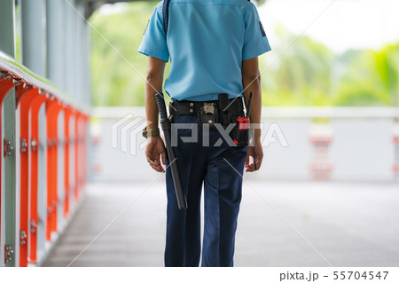 Security guard officers are checking the area Security guard officers are checking the area 55704547