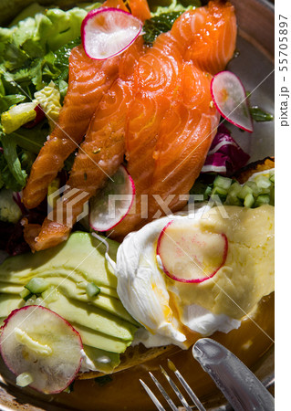 Croissant with egg and salmon. Traditional cuisine Croissant with egg and salmon. Traditional cuisine 55705897
