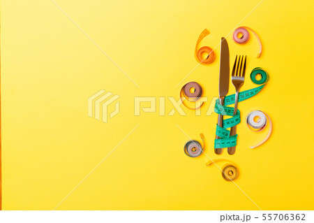 Top view composition of fork and knife with 55706362
