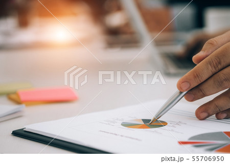Business people analyzing investment graph meeting Business people analyzing investment graph meeting 55706950