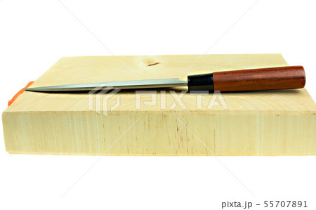 Japanese kitchen deba knife and wood butcher block 55707891