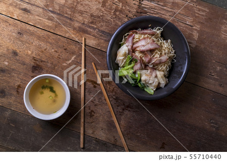 Traditional Thai egg noodles on wooden table top 55710440
