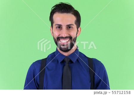 Face of young happy bearded Persian businessman smiling Face of young happy bearded Persian businessman smiling 55712158