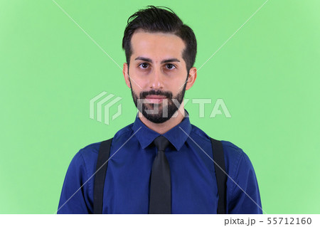 Face of young handsome bearded Persian businessman 55712160