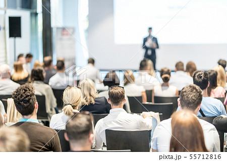 Male business speaker giving a talk at business conference event. Male business speaker giving a talk at business conference event. 55712816