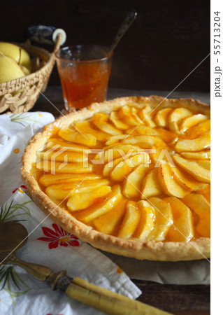 French cuisine: apple tart with apricot jam 55713204