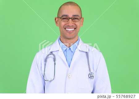 Face of happy bald multi ethnic man doctor smiling Face of happy bald multi ethnic man doctor smiling 55768927