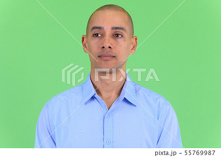 Face of bald multi ethnic businessman thinking Face of bald multi ethnic businessman thinking 55769987
