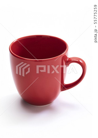 red ceramic mug on white background 55775259