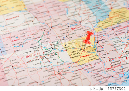 Red clerical needle on a map of USA, Arkansas and 55777302