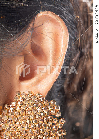 Body Part of Asian female Ear left side Body Part of Asian female Ear left side 55784446