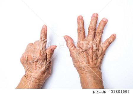 Senior woman's hands counting 7 on white Senior woman's hands counting 7 on white 55801692