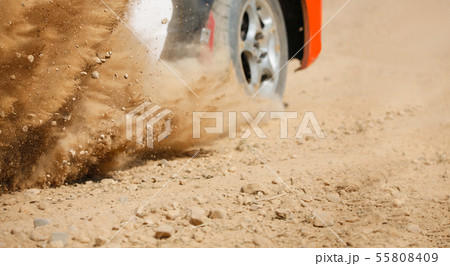 Rally racing car on dirt track 55808409