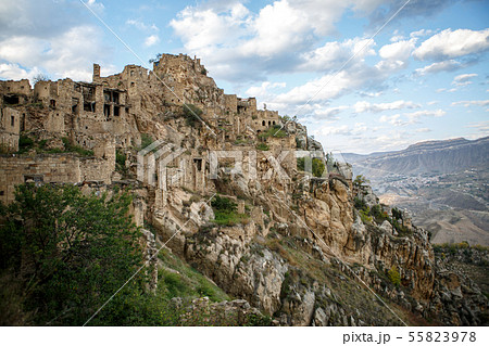 Photo of ancient ruins, mountain area on background of cloudy sky Photo of ancient ruins, mountain area on background of cloudy sky 55823978