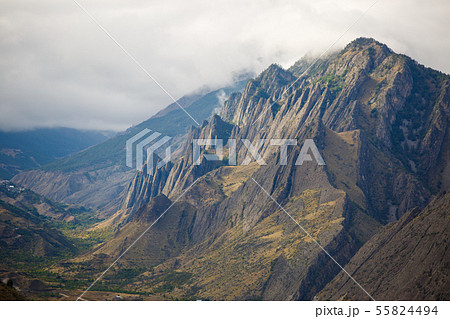 Image of picturesque mountain landscape with green vegetation, cloudy sky on summer 55824494